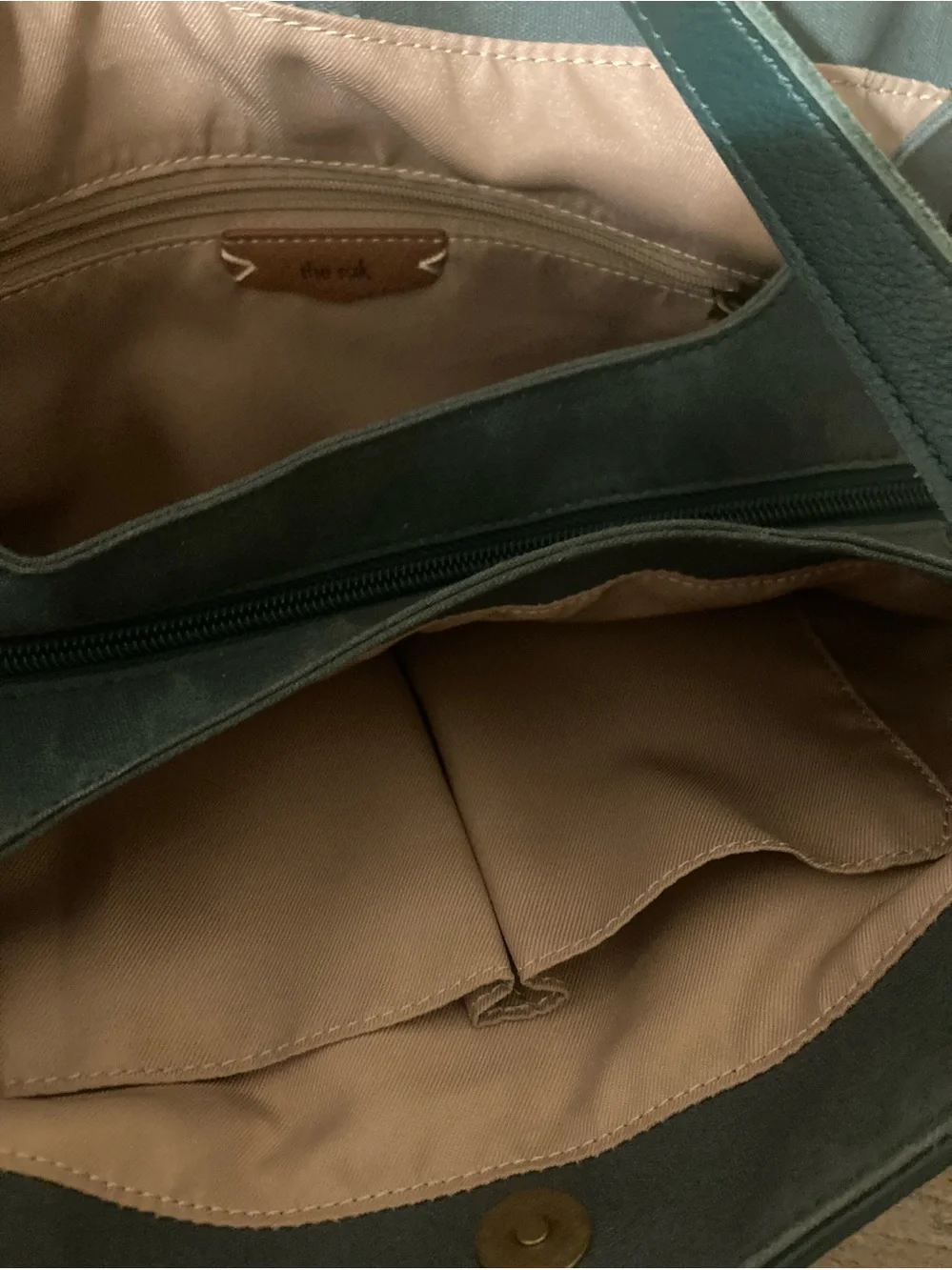 The Sak whipstitch gold everyday